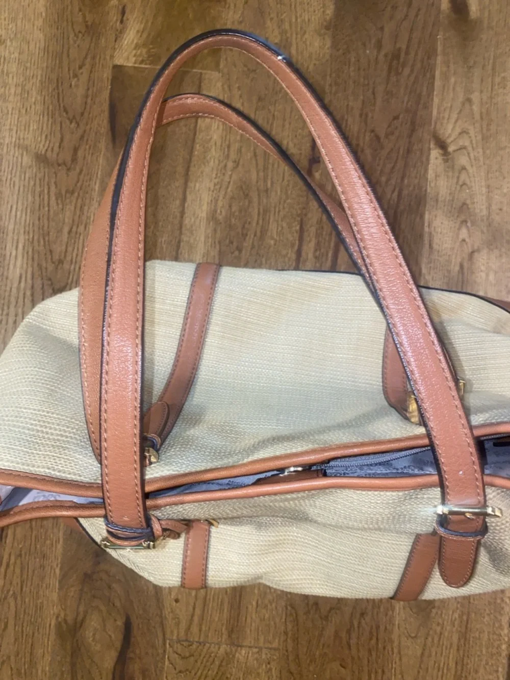Michael Kors Raffia Tote with Tan Leather Trim and handles.